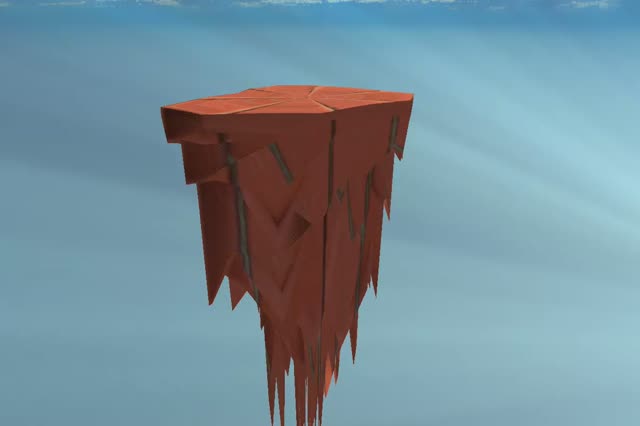 A blocky red-rock island, roughly square on top, splitting into thick columns below.